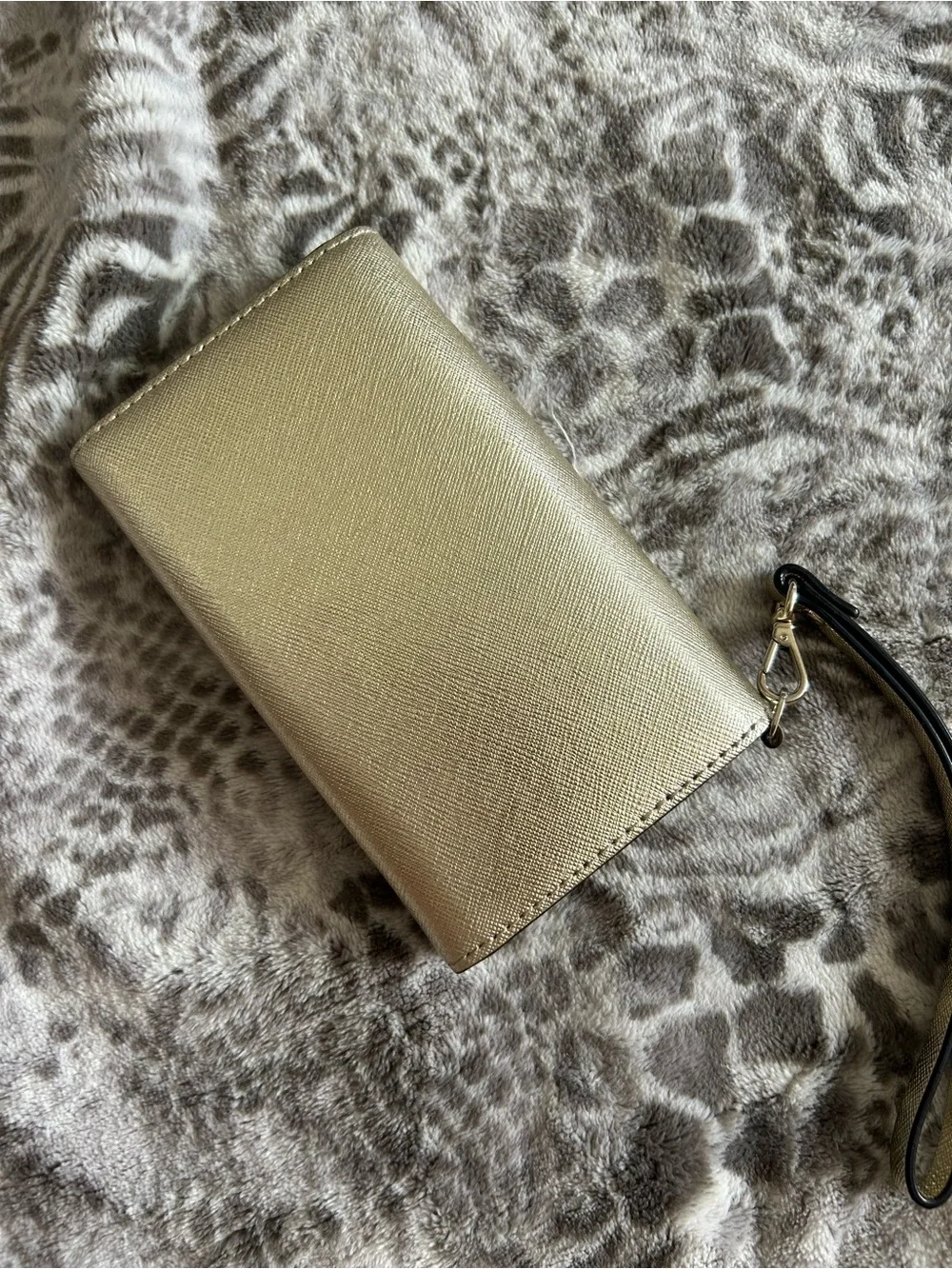 kate spade metallic gold wristlet clutch with black strap